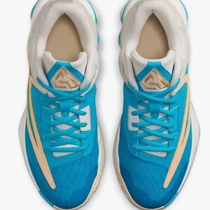 Nike Blue Athletic Shoes with Cream Accents